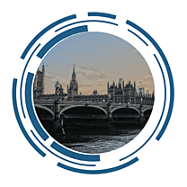 A view of the parliamentary buildings in Westminster, London, UK. The image is framed by a circular, futuristic design.